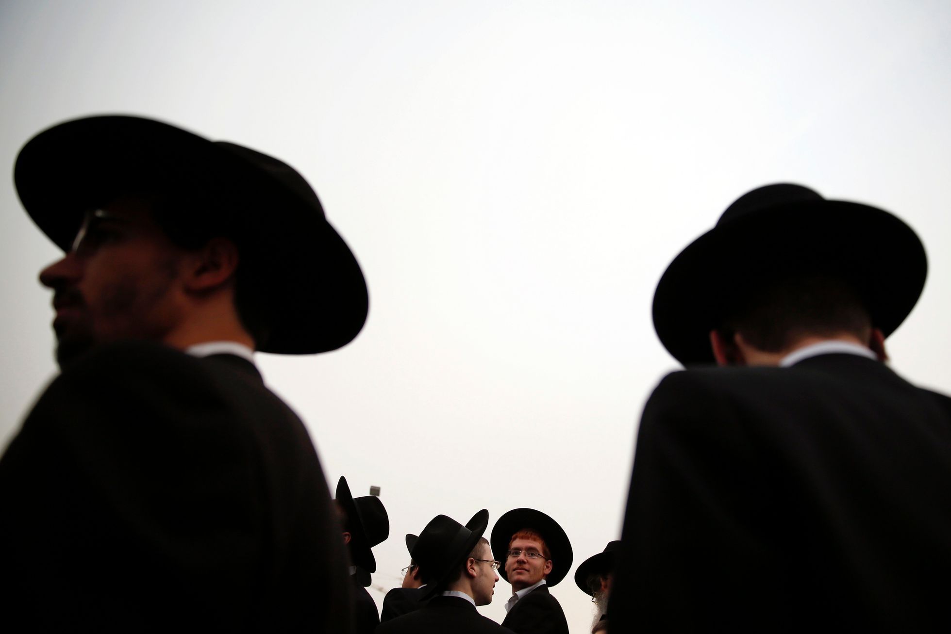Ultra-Orthodox Jewish men attend a mass prayer in Jerusalem