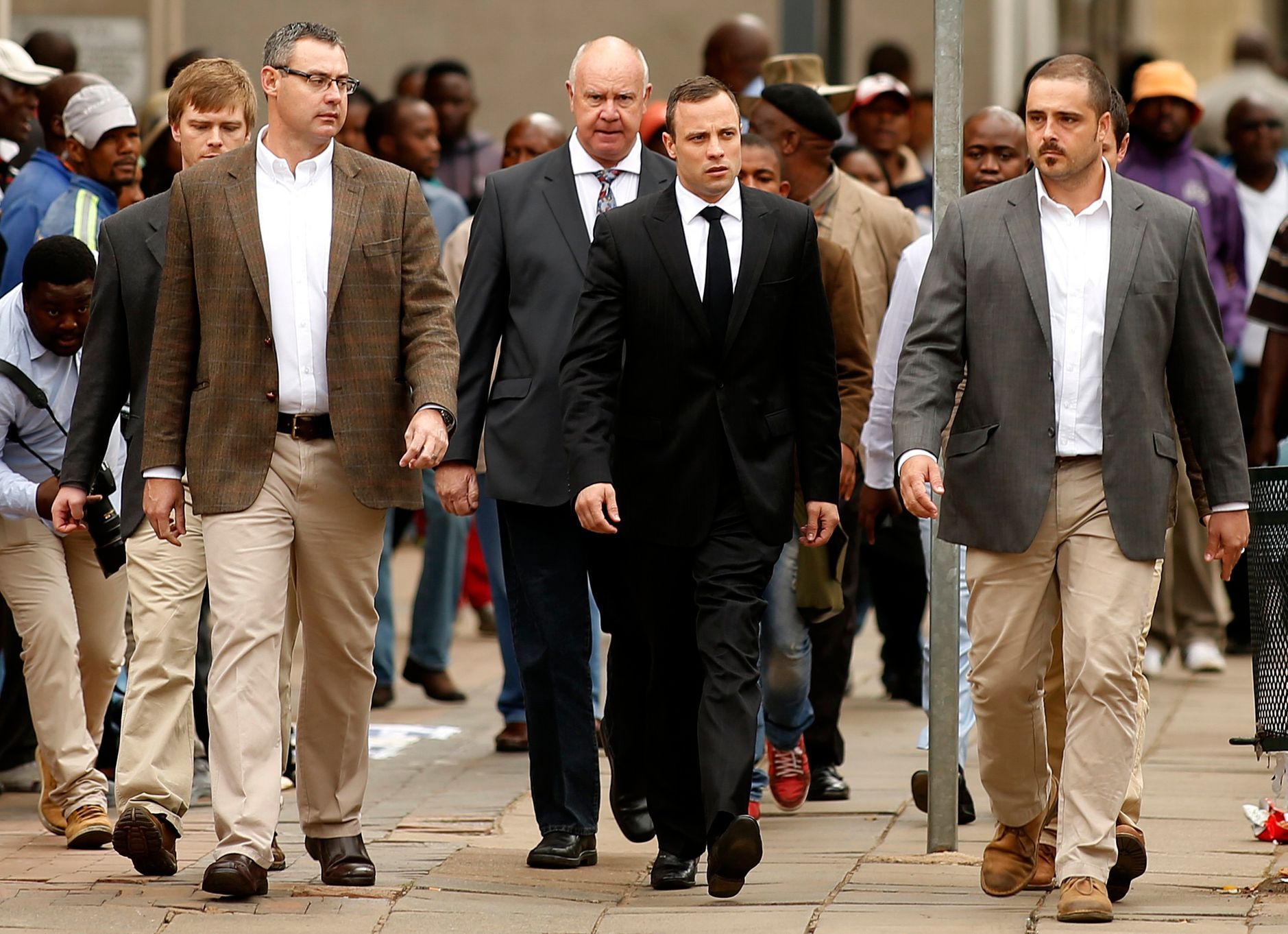 Oscar Pistorius přichází k soudu, 9. dubna 2014.