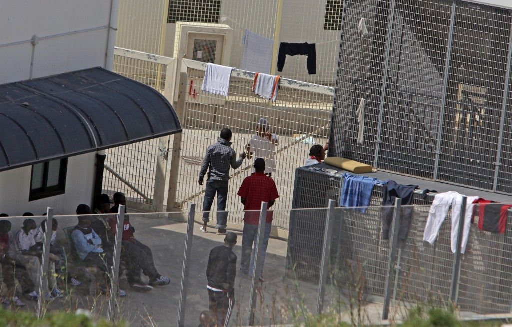 Migranti na Lampeduse - přijímací centra