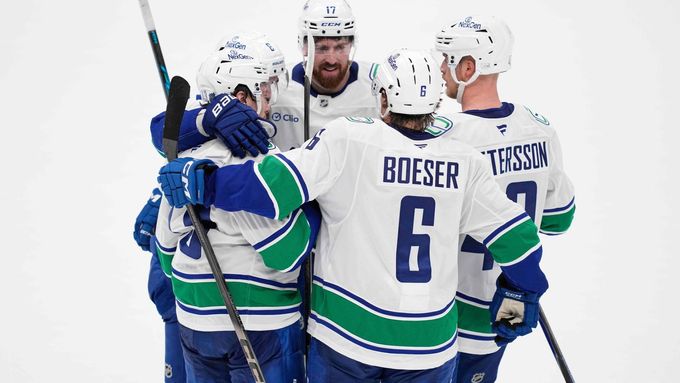 Conor Garland, Brock Boeser, Filip Hronek and Elias Pettersson