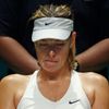 Maria Sharapova of Russia rests in between games in the second set against Petra Kvitova of the Czech Republic at the Singapore Indoor Stadium