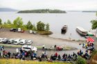 Youths stand in a line to wait for the MS Thorbjorn ferry to take them to Utoya island