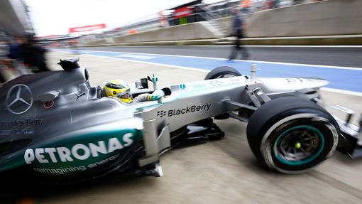 Mercedes Formula One driver Nico Rosberg of Germany exits his garage during the second practice session for the British Grand Prix at the Silverstone Race circuit, centra