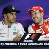 Third placed Ferrari driver Sebastian Vettel of Germany gestures next to race winner Mercedes Formula One driver Lewis Hamilton of Britain during a news conference after the Australian F1 Grand Prix a