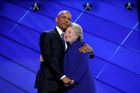 Democratic presidential nominee Clinton hugs U.S. President Obama as she arrives onstage at the end of his speech on the third night of the 2016 Democratic National Convention in Philadelphia