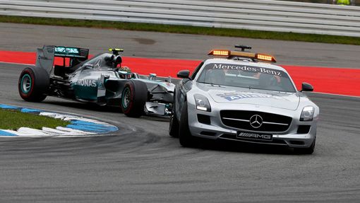 The safety car drives in front of Mercedes Formula One driver Nico Rosberg of Germany before the German F1 Grand Prix at the Hockenheim racing circuit July 20, 2014. REUT