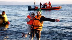 Afghánští uprchlíci krátce poté, co připluli k břehům řeckého ostrova Lesbos.