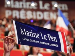 A banner which reads &quot;Marine Le Pen, People's voice, France's spirit&quot; is seen during a meeting of Marine Le Pen in Lyon