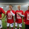 Fotbalisté pražské Slavie (zleva) Ondřej Petrák, Lukáš Jarolím a Štěpán Koreš se radují z vítězství v utkání 9. kola Gambrinus ligy 2012/13 se Spartou.