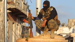 Bojovník Al-Nusrá v syrské provincii Idlib