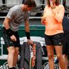 Britain's Murray listen and his coach and former tennis player Mauresmo arrive for a training session for the French Open tennis tournament at the Roland Garros stadium in Paris