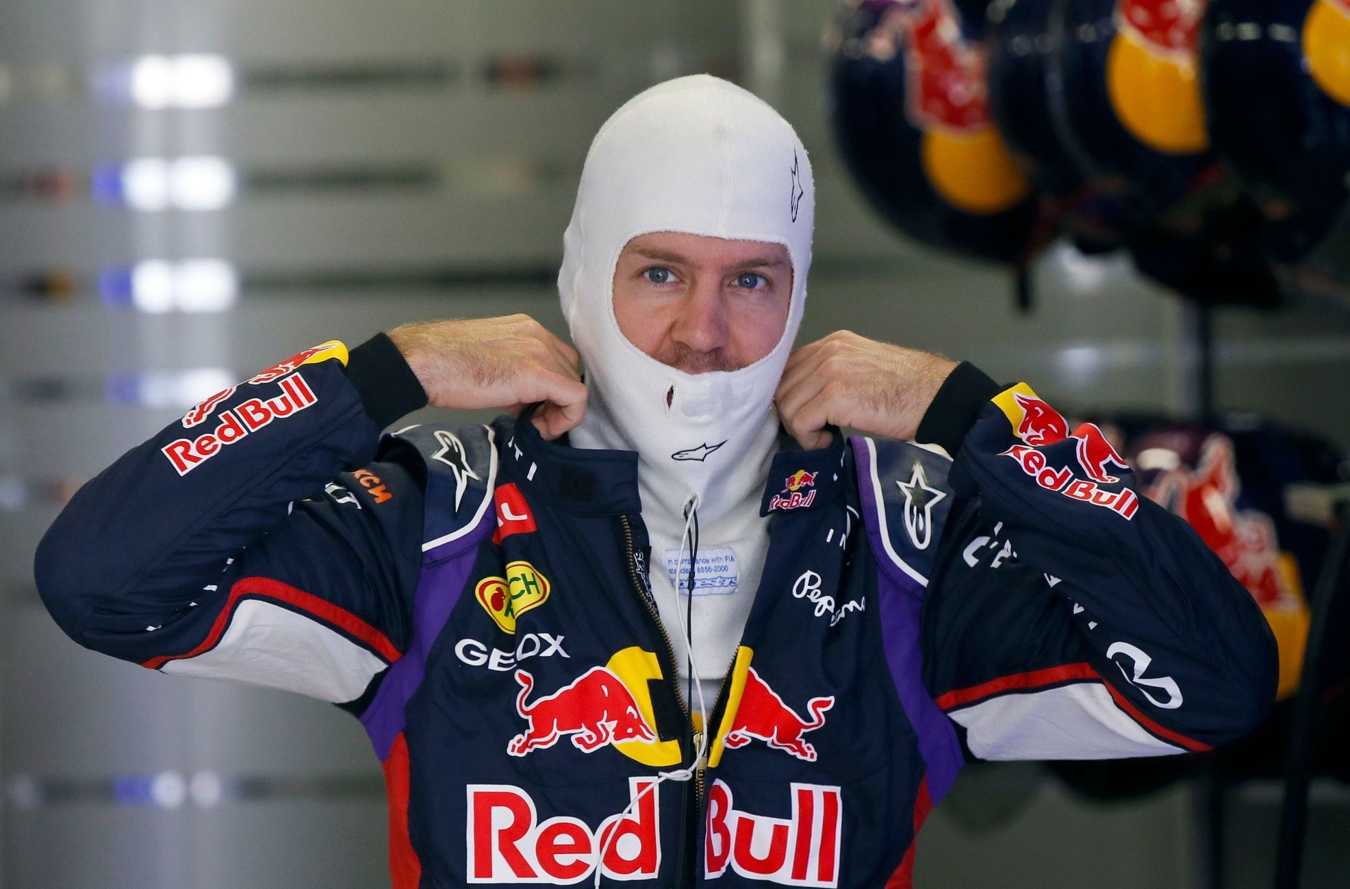 Red Bull Formula One driver Sebastian Vettel of Germany prepares for the third free practice session at the Russian F1 Grand Prix in the Sochi Autodrom circuit