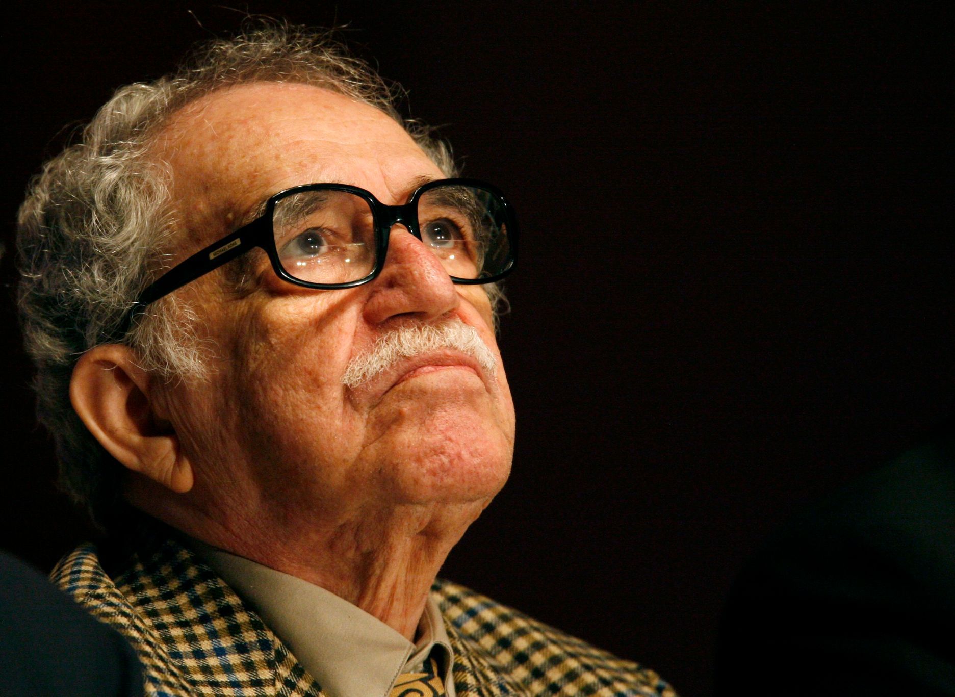 Colombian Nobel Prize laureate Gabriel Garcia Marquez listens to a speech during the New Journalism Prize awards ceremony at the Museum of Contemporary Art (MARCO) in Monterrey