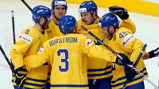 Sweden's Joakim Lindstrom (2nd R) celebrates his goal against the Czech Republic with team mates during the first period of their men's ice hockey World Championship bron
