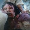 Fotografie raněného Kaddáfího (z videozáznamu)