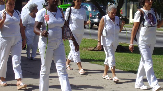 Ladies in white in the streets of Havana