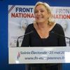 Marine Le Pen, France's National Front political party head, reacts to results after the polls closed in the European Parliament elections at the party's headquarters in Nanterre