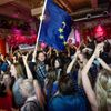 Party workers at the Swedish Feminist Initiative, celebrate to the exit polls that make the party Sweden's second biggest party in the European Parliament elections, in Stockholm