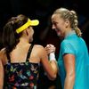 Radwanska of Poland is congratulated by Kvitova of the Czech Republic during their WTA Finals singles tennis match at the Singapore Indoor Stadium