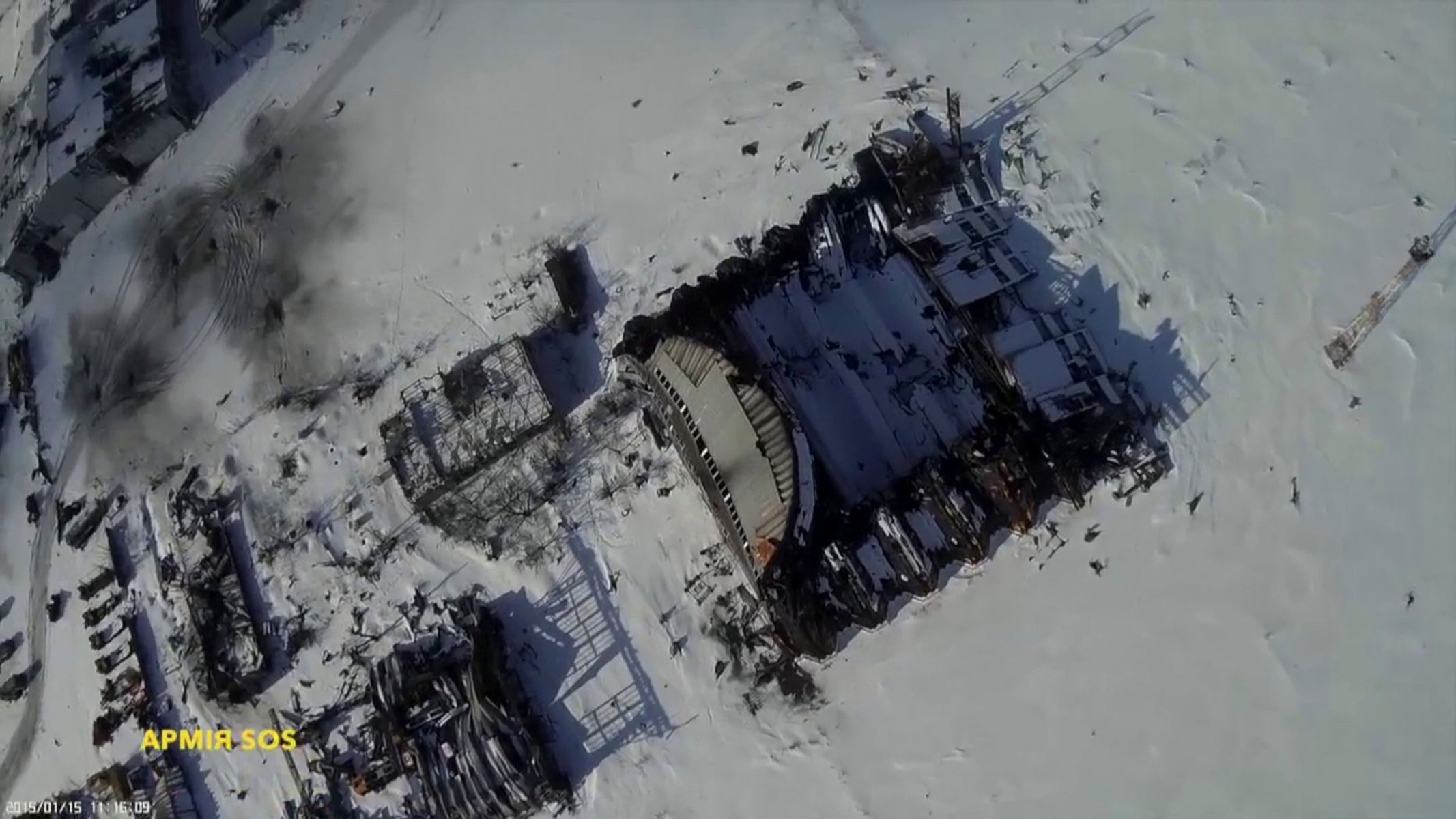 Still image taken from handout aerial footage shot by a drone of buildings of the Sergey Prokofiev International Airport damaged by shelling during fighting between pro-Russian separatists and Ukraini