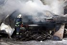 Při hašení domu na Litoměřicku objevili hasiči tělo. Okolnosti úmrtí šetří policie