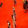 Model Garrn arrives with other guests on the red carpet for the screening of the movie 'Nobody Wants the Night', during the opening gala of the 65th Berlinale International Film Festival, in Berlin