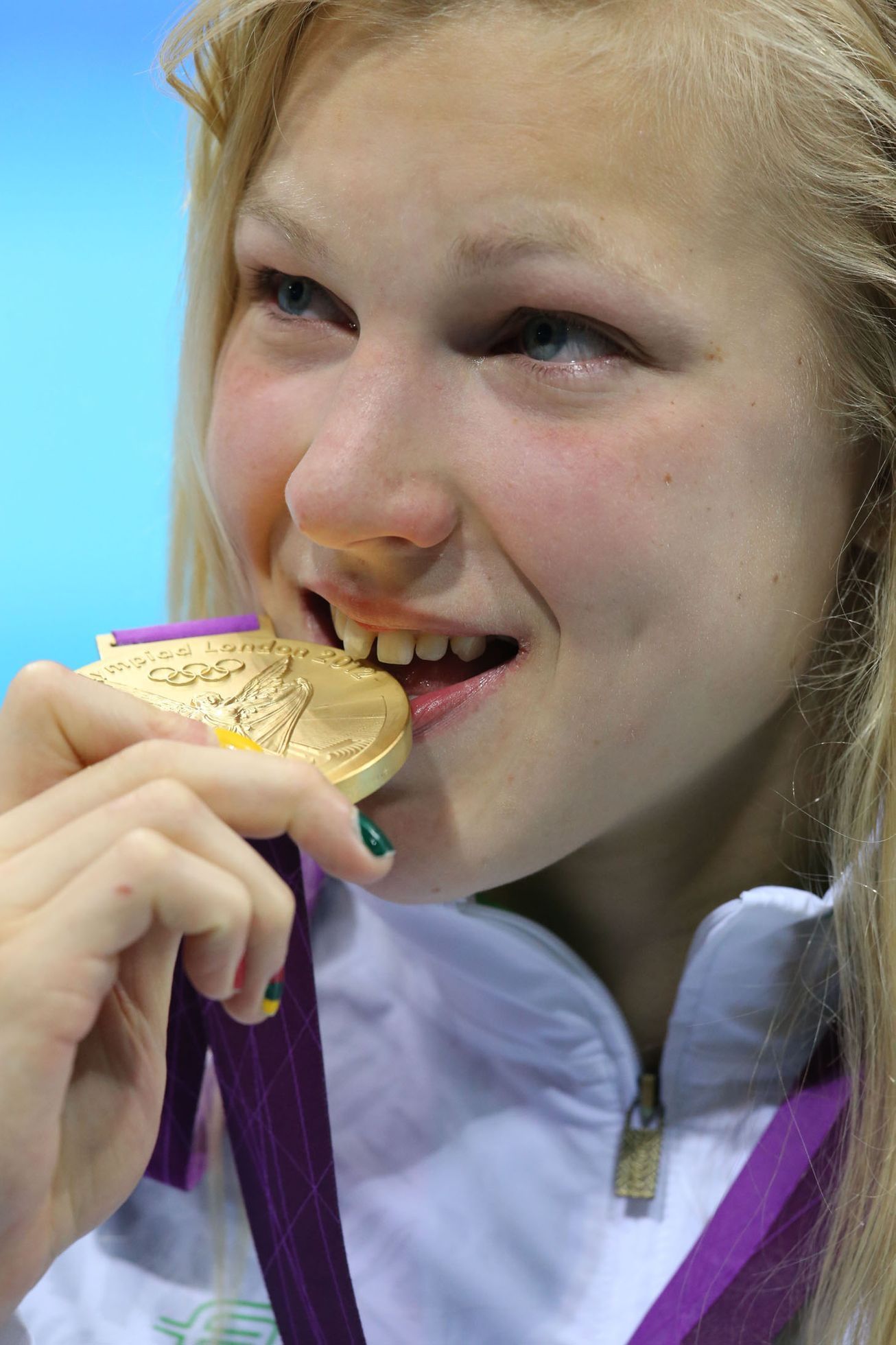 Litevská plavkyně Ruta Meilutyteová se zlatou medailí na OH v Londýně 2012