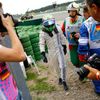 Williams Formula One driver Massa of Brazil walks off the track after crashing with his car in the first corner after the start of the German F1 Grand Prix at the Hockenheim racing circuit