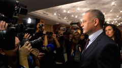 Candidate for the presidential election Andrej Kiska addresses journalists after the first unofficial results at a party election centre in Bratislava