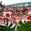 Japan celebrate victory after the match