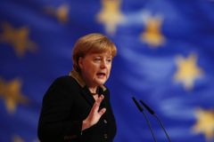 Kancléřka Merkelová varuje před měnovými válkami