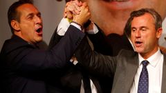 Presidential candidate Hofer of the Austrian Freedom Party (FPOe) and party head Strache sing a song during party celebrations after Austrian presidential election in Vienna