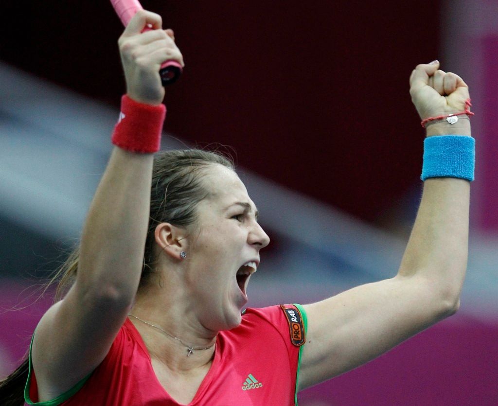 Ruská tenistka Anastasia Pavljučenkovová slaví vítězství nad Lucií Šafářovou ve finále Fed Cupu 2011 proti České republice.