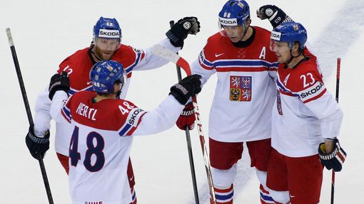 Ondrej Nemec of the Czech Republic (R) celebrates his goal against the U.S. with team mates during the second period in their men's ice hockey World Championship quarter-