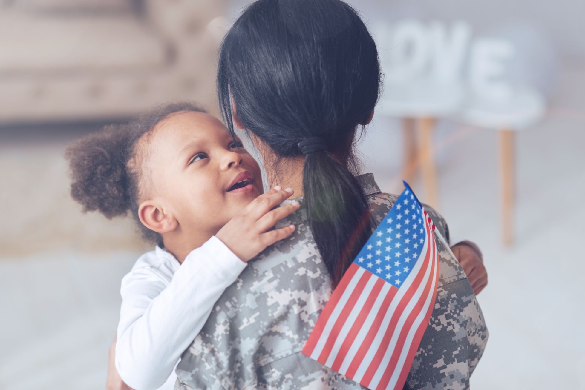 Vojačka US Army s dítětem ilu