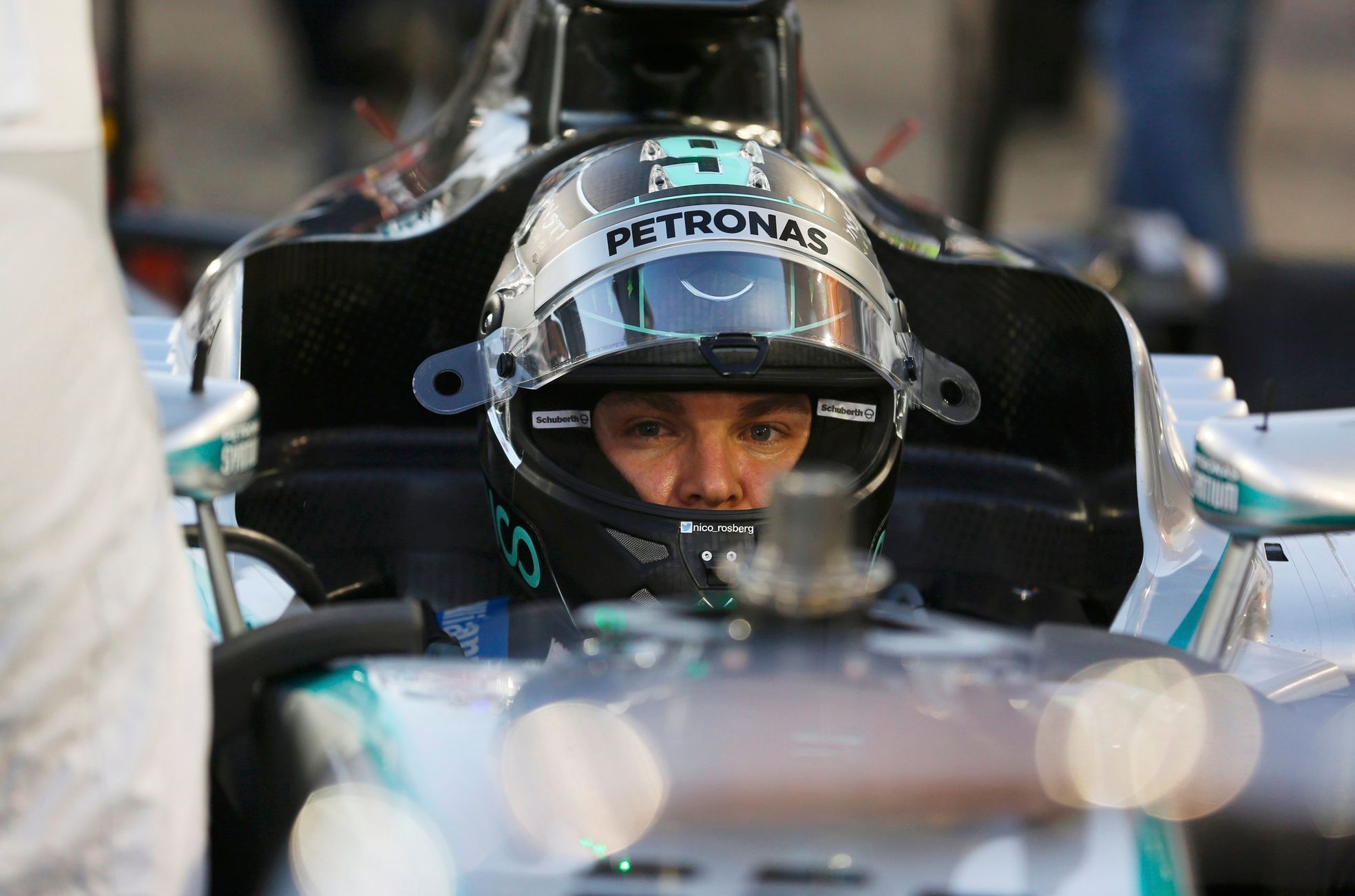 Mercedes Formula One driver Nico Rosberg of Germany sits in his car before the start of the Bahrain F1 Grand Prix at the Bahrain International Circuit (BIC) in Sakhir