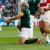 South Africa's Adriaan Strauss celebrates scoring their fourth try