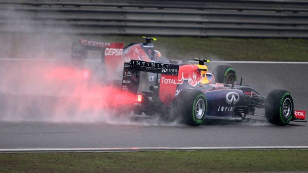 Red Bull Racing Formula One driver Ricciardo of Australia and Toro Rosso Formula One driver Kvyat of Russia drive during the third practice session of the Chinese F1 Grand Prix at the Shanghai Interna
