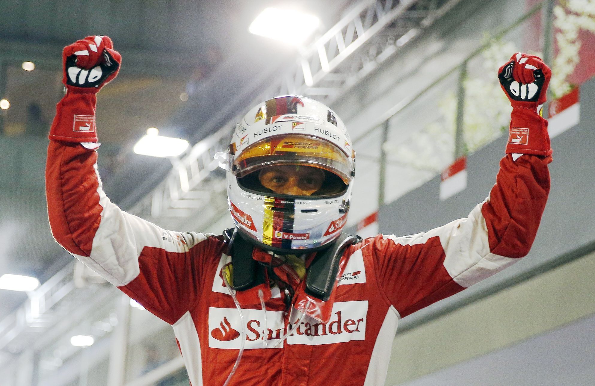 Ferrari Formula One driver Vettel of Germany reacts after winning the Singapore F1 Grand Prix