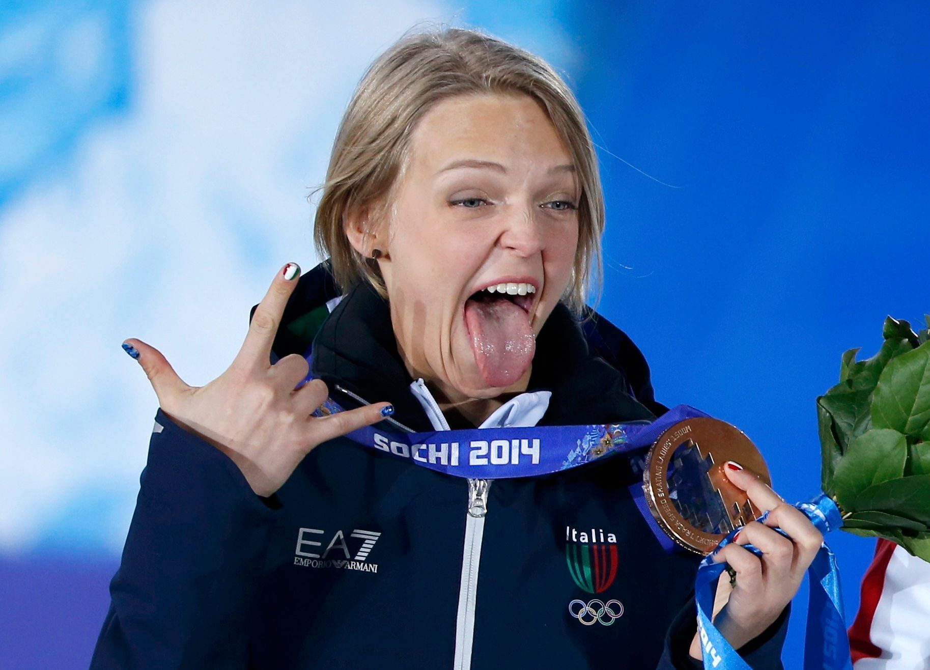 Fontana celebrates during the victory ceremony for the women's 1,500 metres short track speed skating event at the 2014 Sochi Winter Olympics in Sochi