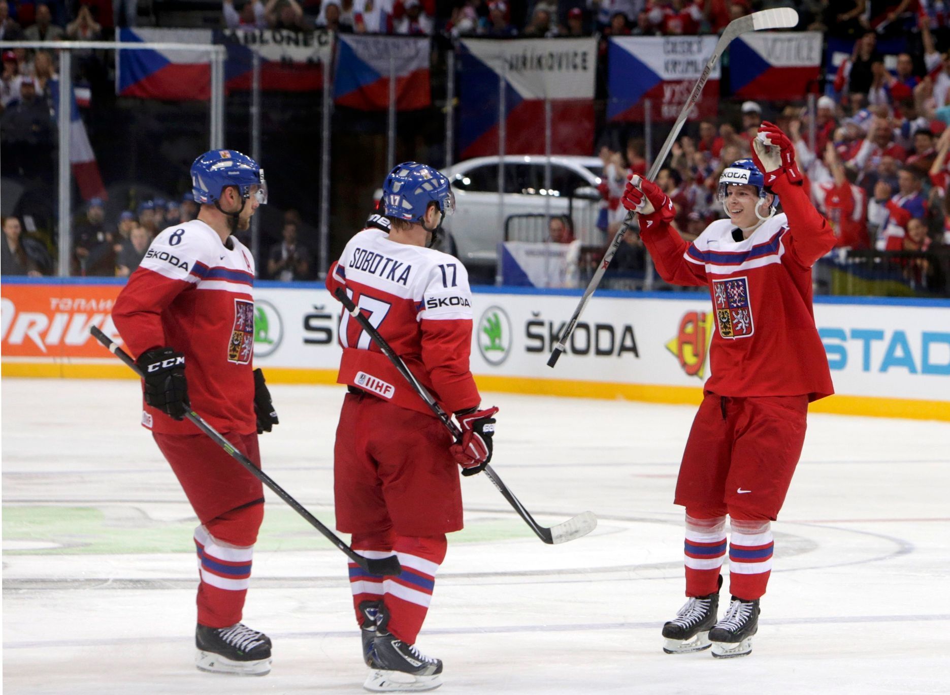 Sobotka of the Czech Republic celebrates his goal with team mates Hejda and Krejcik during their Ice Hockey World Championship game against France in Prague