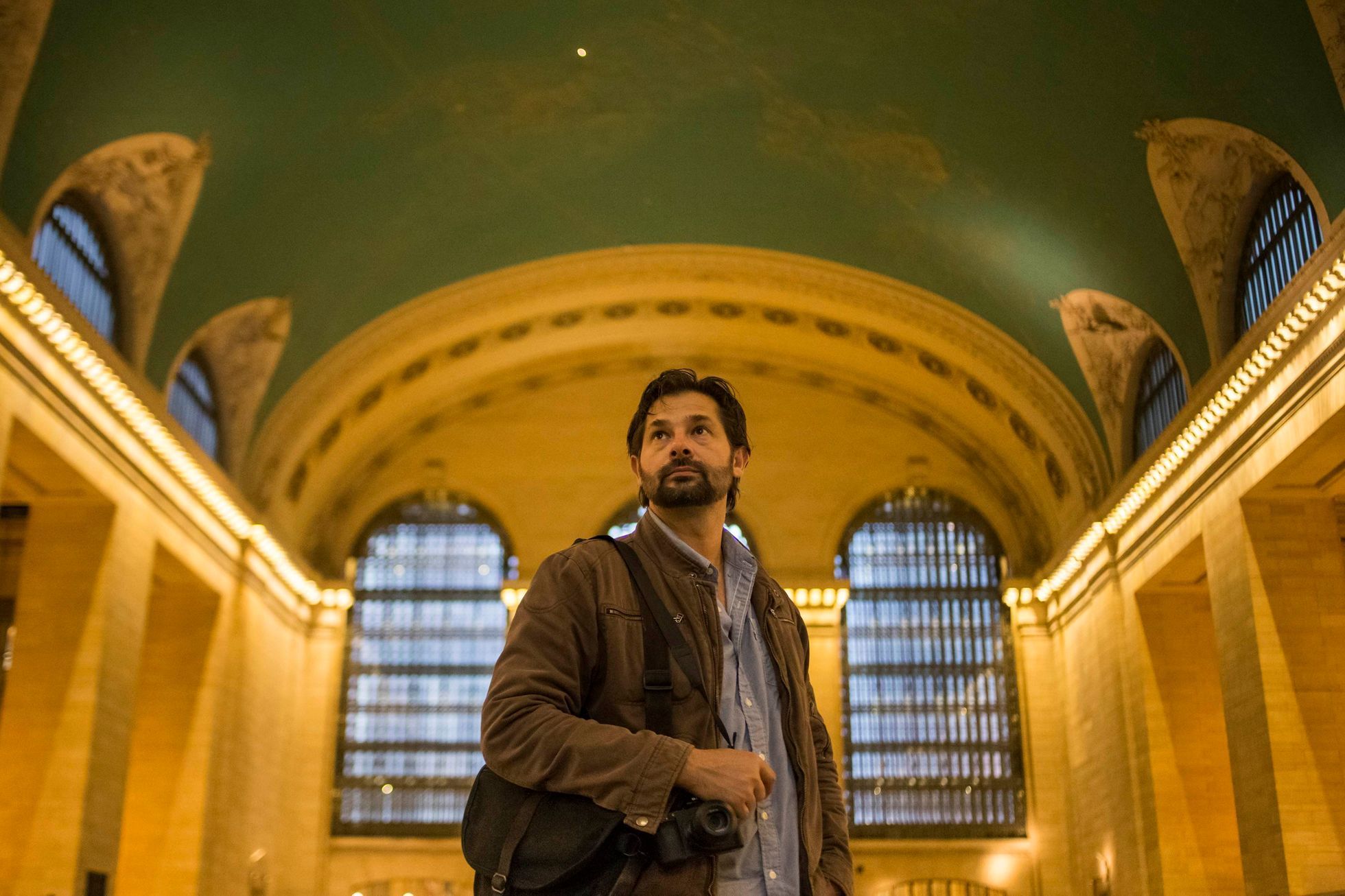 Australian freelance photojournalist Daniel Berehulak poses for a portrait in Grand Central Terminal in New York