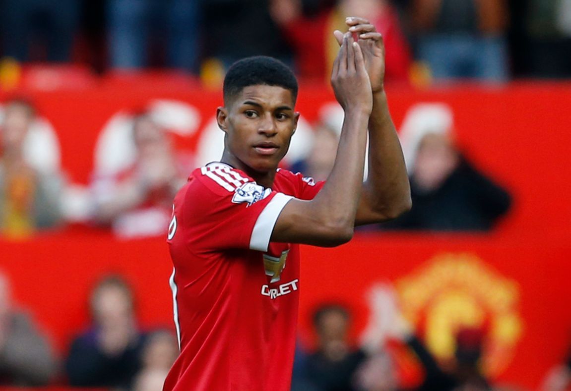 Manchester United's Marcus Rashford applauds their fans after the match