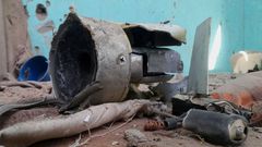 Remnants of a shell that targeted the refugee center, in El Fasher