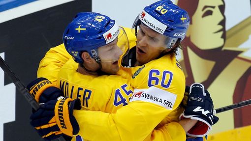Sweden's Oscar Moller (L) celebrates his goal against the Czech Republic with team mate Mikael Backlund during the first period of their men's ice hockey World Championsh