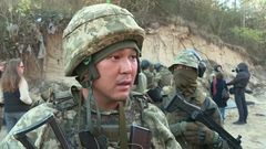 Dobrovolný voják Gennadij bojující v praporu Sibir