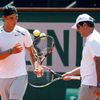 Rafael Nadal of Spain and his coach Toni Nadal attend a training session for the French Open tennis tournament at the Roland Garros stadium in Paris