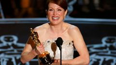 Julianne Moore accepts the Oscar for Best Leading Actress for her role in &quot;Still Alice&quot; at the 87th Academy Awards in Hollywood, California