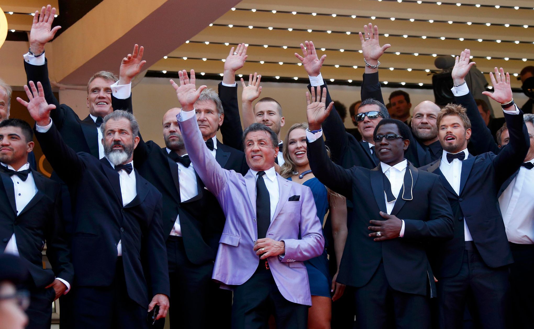 Actor Sylvester Stallone and cast members of the film &quot;The Expendables 3&quot; pose on the red carpet during the 67th Cannes Film Festival in Cannes