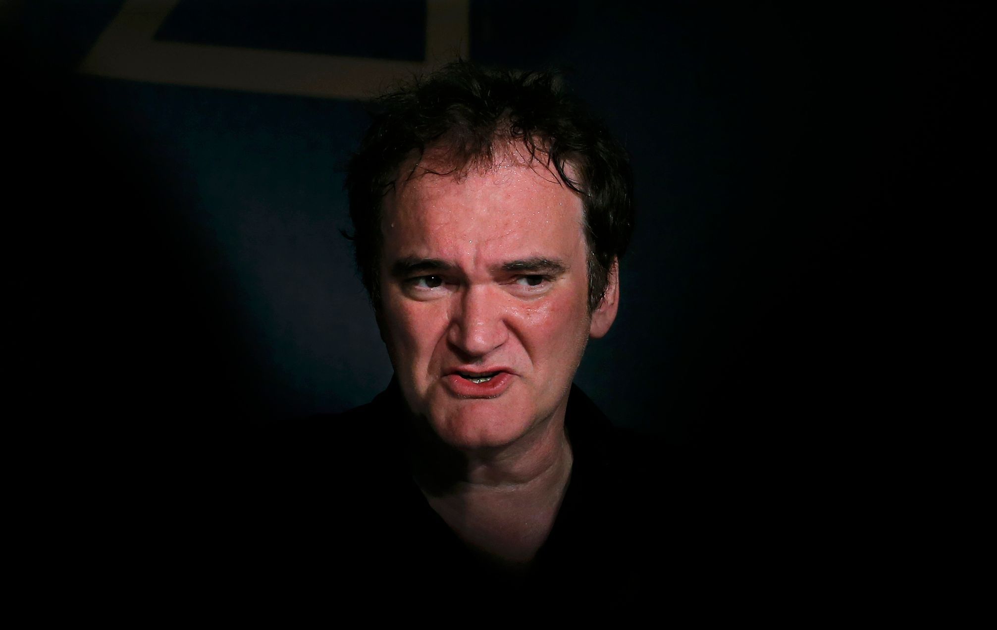 Director Quentin Tarantino attends a news conference during the 67th Cannes Film Festival in Cannes
